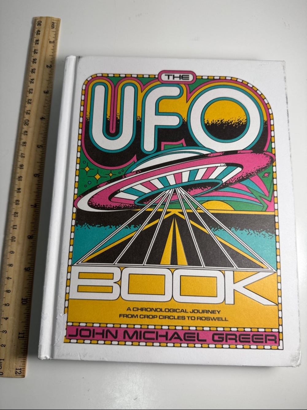 John Michael Greer The UFO Book — White Hardcover with Multicolor Retro Cover